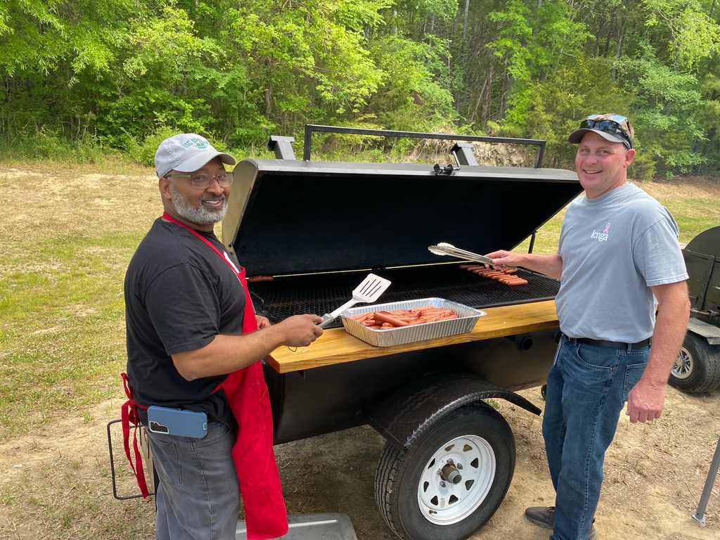 Mr.Orr cooking hotdogs.
