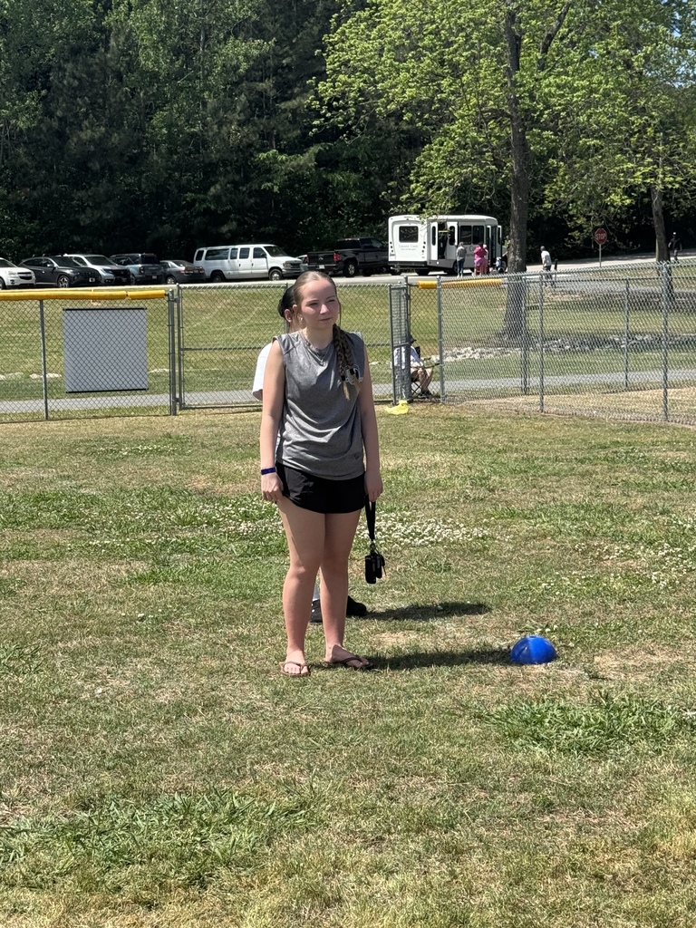 Student volunteer on field
