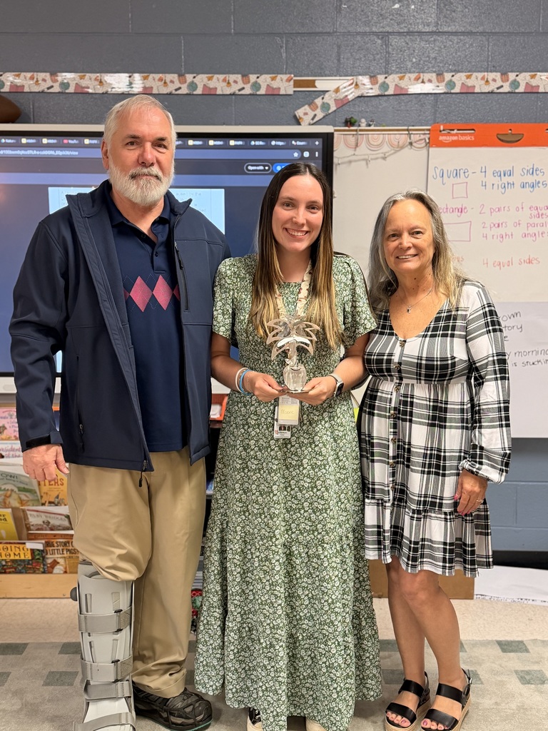 Moore with her parents