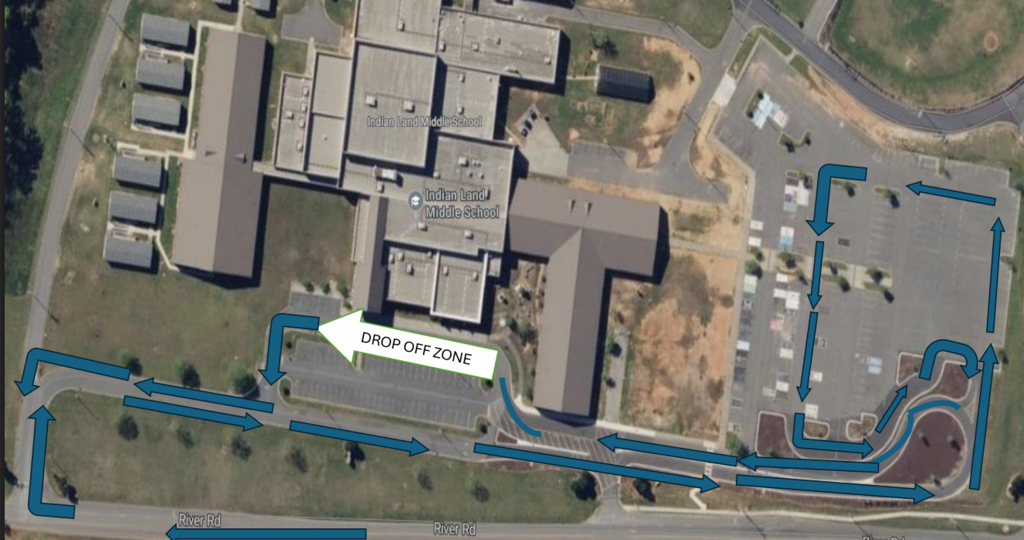 A top-down view of a building, with marked paths and a drop-off zone indicated by arrows.