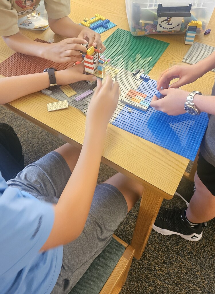 Students are building with Legos.
