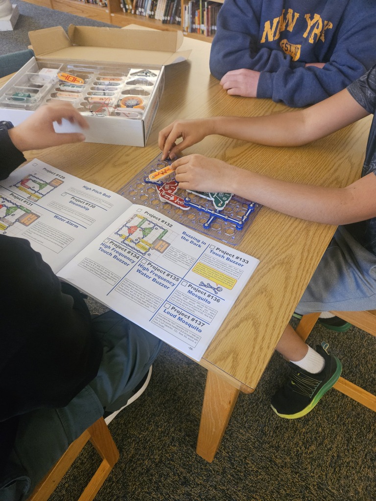 Students putting together circuits.