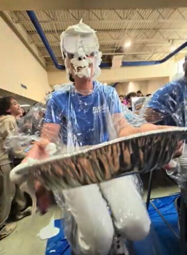 image of assistant principal getting pied in the face 