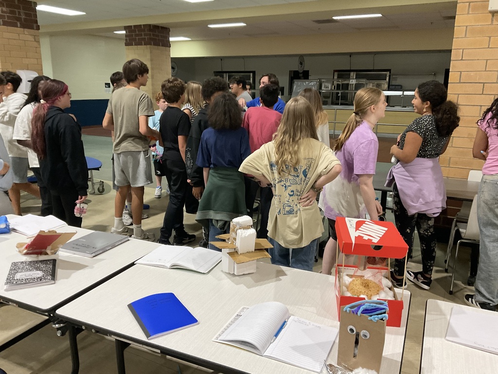 image of Mr. Sas with students 