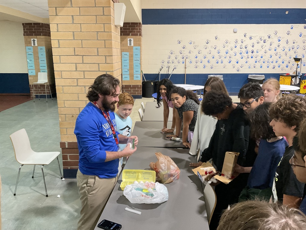 image of Mr. Sas with students 