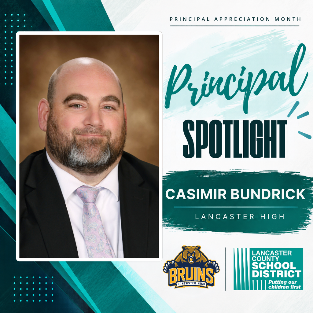 Man with short beard and mustache in black suit and tie. Text reads "Principal Spotlight Casimir Bundrick Lancaster High".