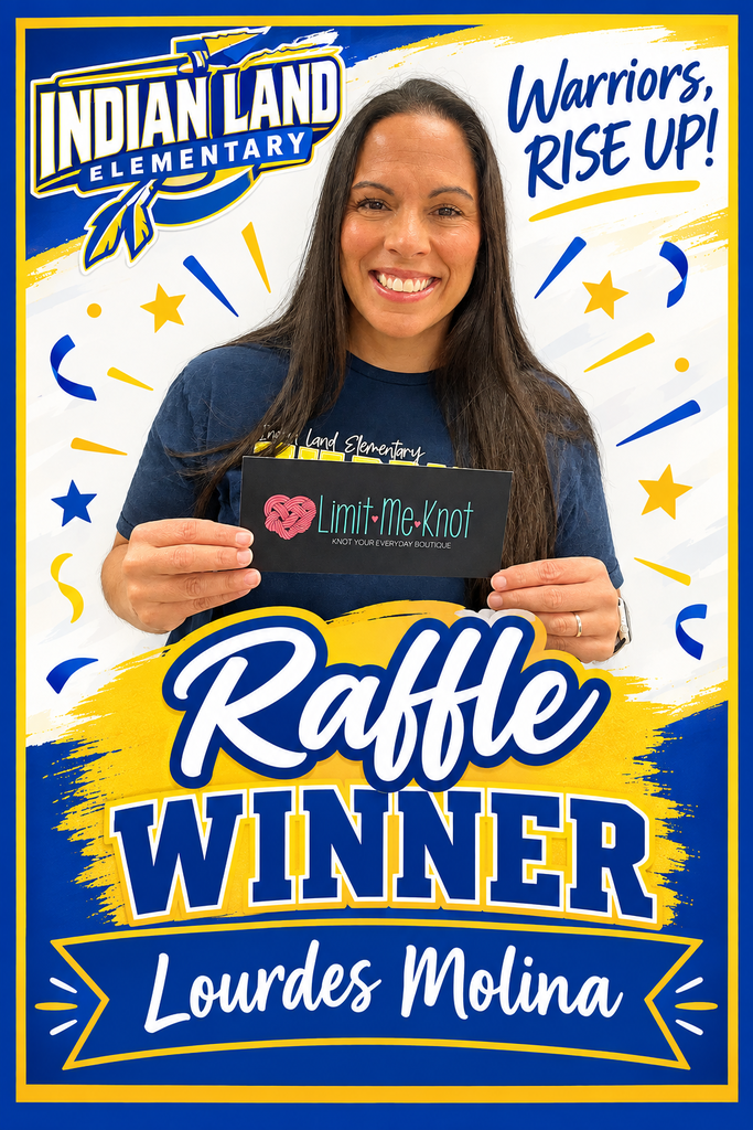 Indian Land Elementary attendance clerk posing and holding raffle prize.