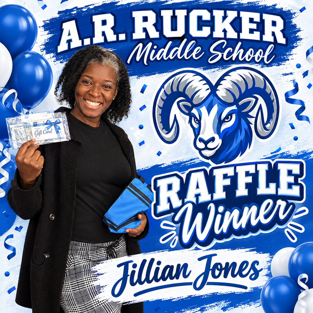 A.R. Rucker Middle attendance clerk posing holding raffle prize.