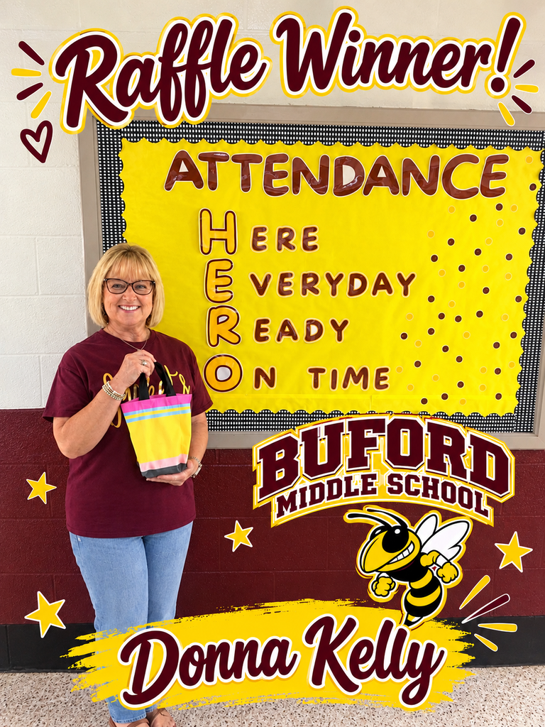 Buford Middle attendance clerk posing and holding raffle prize.