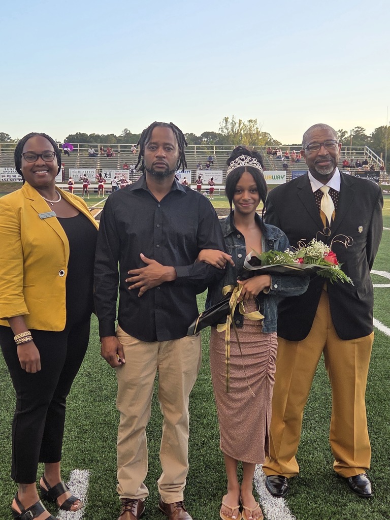 Homecoming photo of LJH 2025-2026 Homecoming Queen Z. Porter and her dad with Principal Dudley and AP Brasfield.