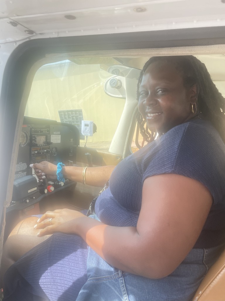 Lanett City Schools 5th and 6th grade students and teachers are at the Lanett Municipal Airport. They are shown looking closely at airplanes and various airport equipment as they learn about aviation.