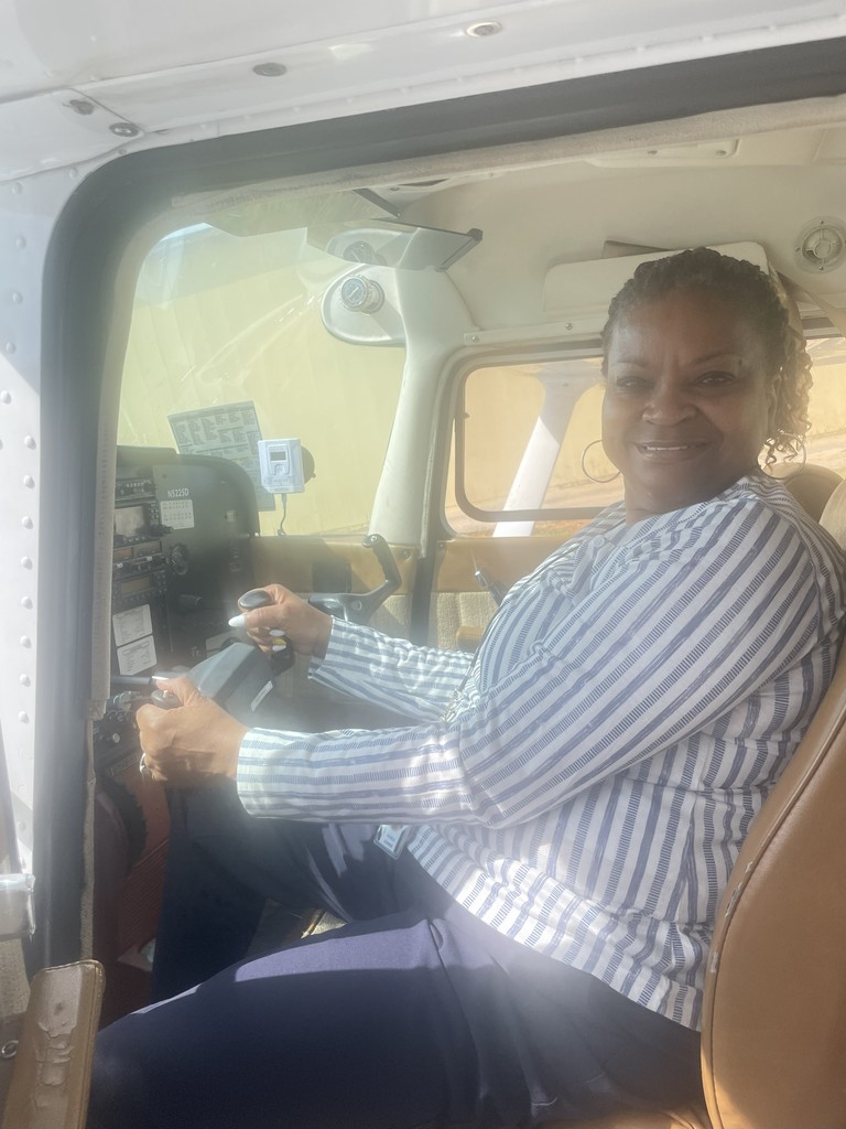 Lanett City Schools 5th and 6th grade students and teachers are at the Lanett Municipal Airport. They are shown looking closely at airplanes and various airport equipment as they learn about aviation.