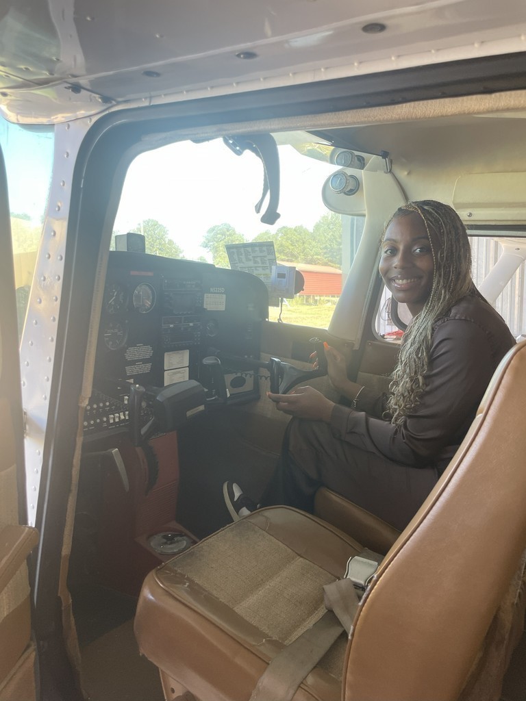 Lanett City Schools 5th and 6th grade students and teachers are at the Lanett Municipal Airport. They are shown looking closely at airplanes and various airport equipment as they learn about aviation.