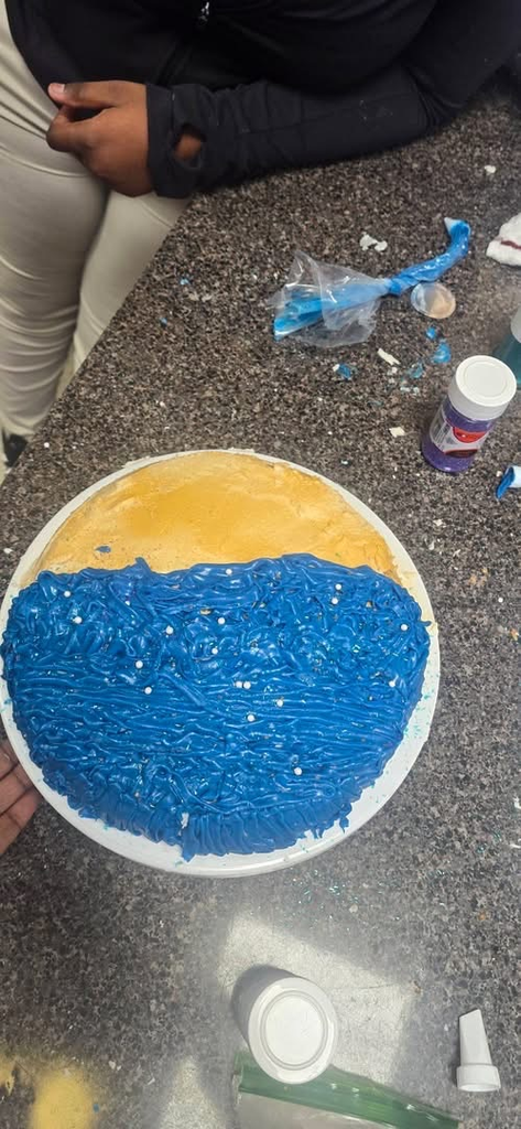 Students showed creativity, teamwork, and presentation while designing their cakes.