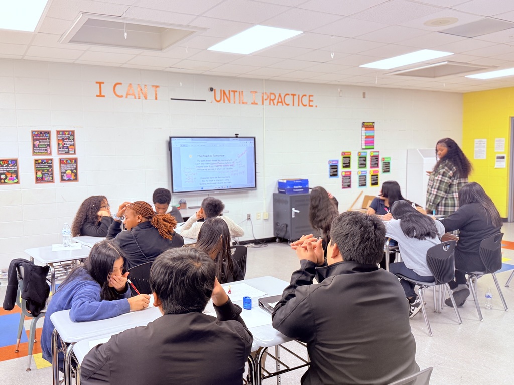 Students Annotating text; Teacher checks for understanding