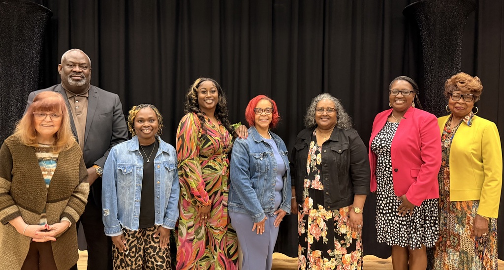 From left to right, Gail Holley, Myron Fears, Leilani Rudd, Ashley Holloway, Angela Hargett, Suzanne Vaughn, Superintendent Jennifer Boyd, and Board President Gwen Harris-Brooks