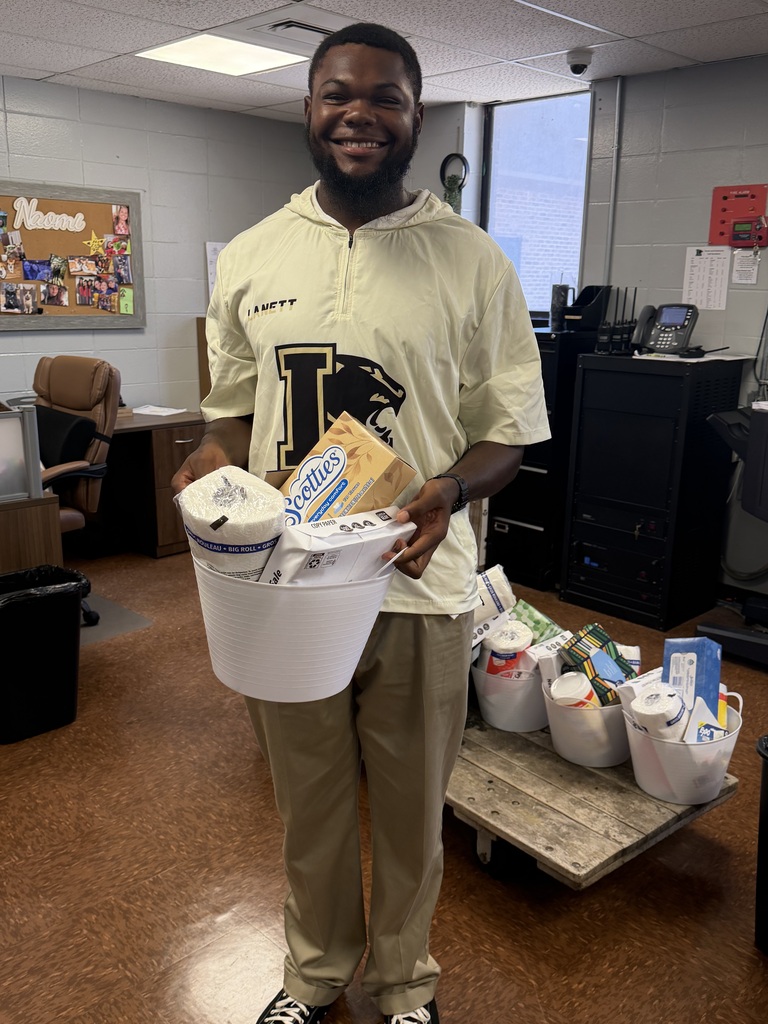 Picture of Mr. Abner getting his basket of goodies! 