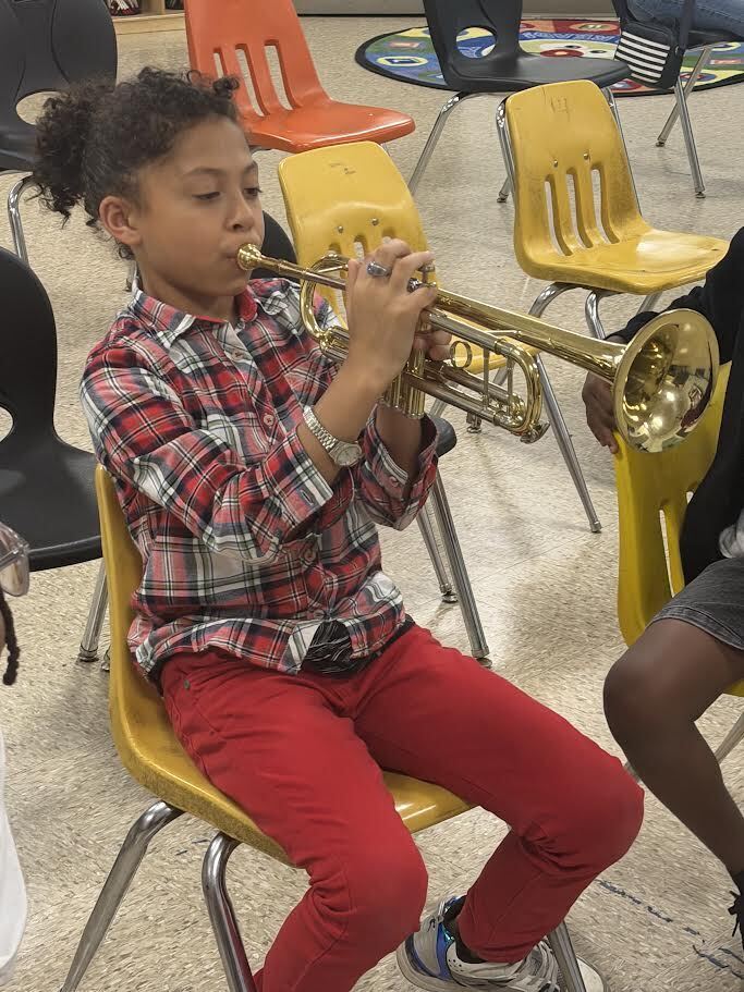 Band student playing the trumpet