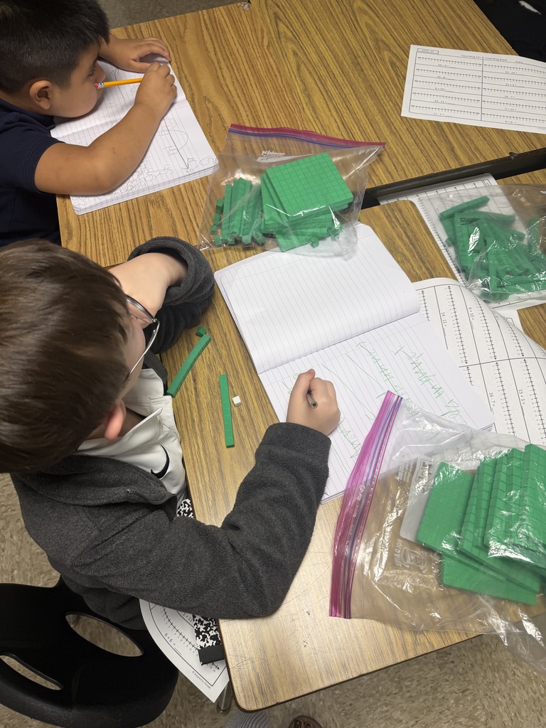 Students using manipulatives to solve problems!