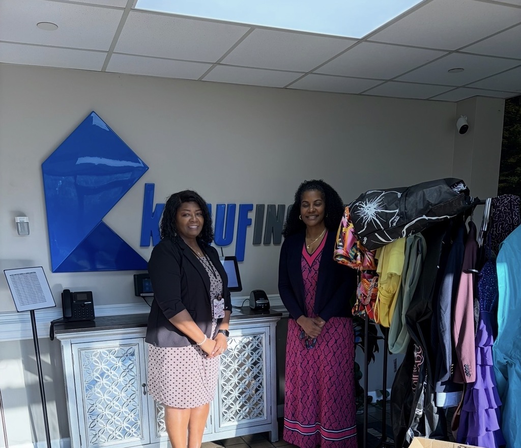 Ms. Carlisle and Ma Coley, HR Manager at Knauf