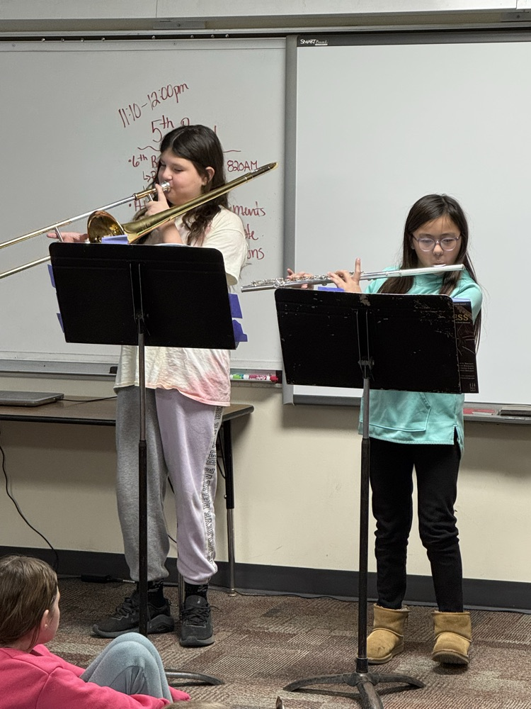 flute and trombone duet both girls playing a Christmas song