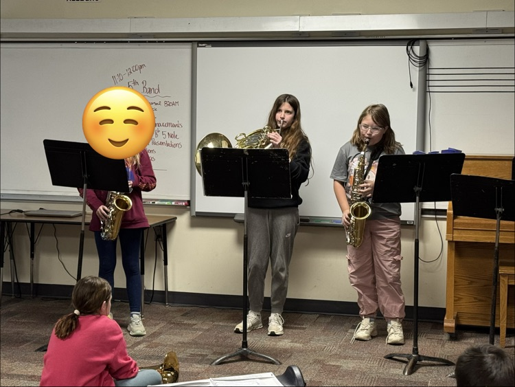 one French horn and two saxophones