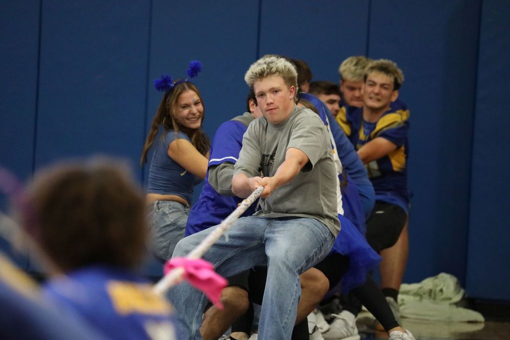 Head-on picture of students  playing tug of war