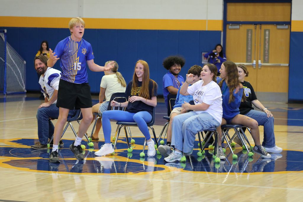 A student reacting to losing at musical chairs