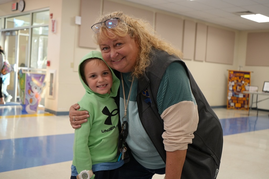student with principal at curriculum night