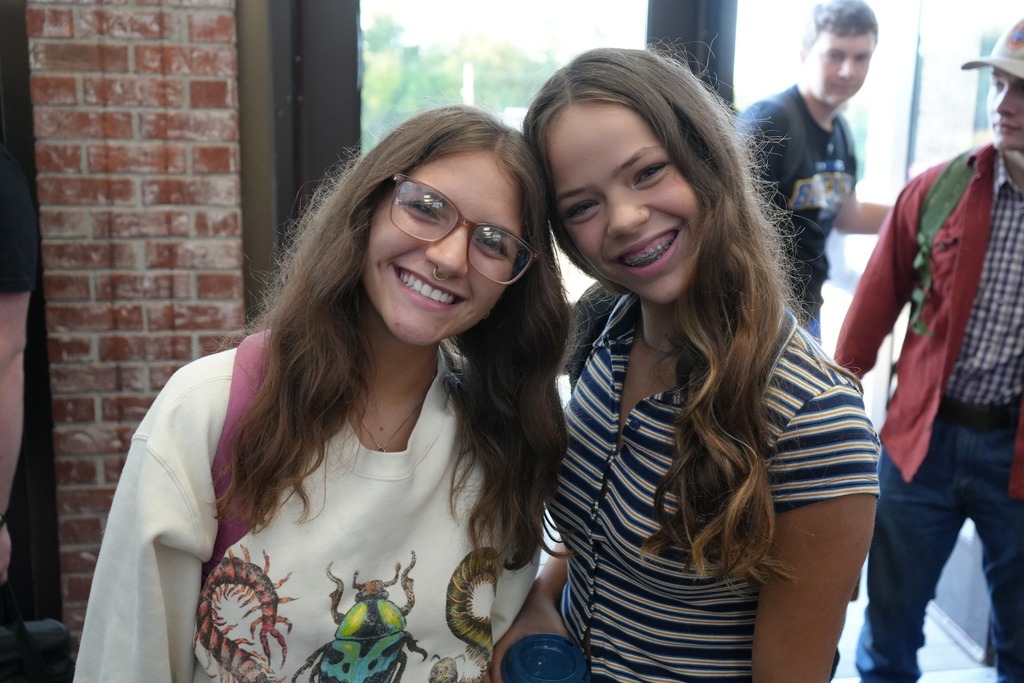 two students from high school smiling