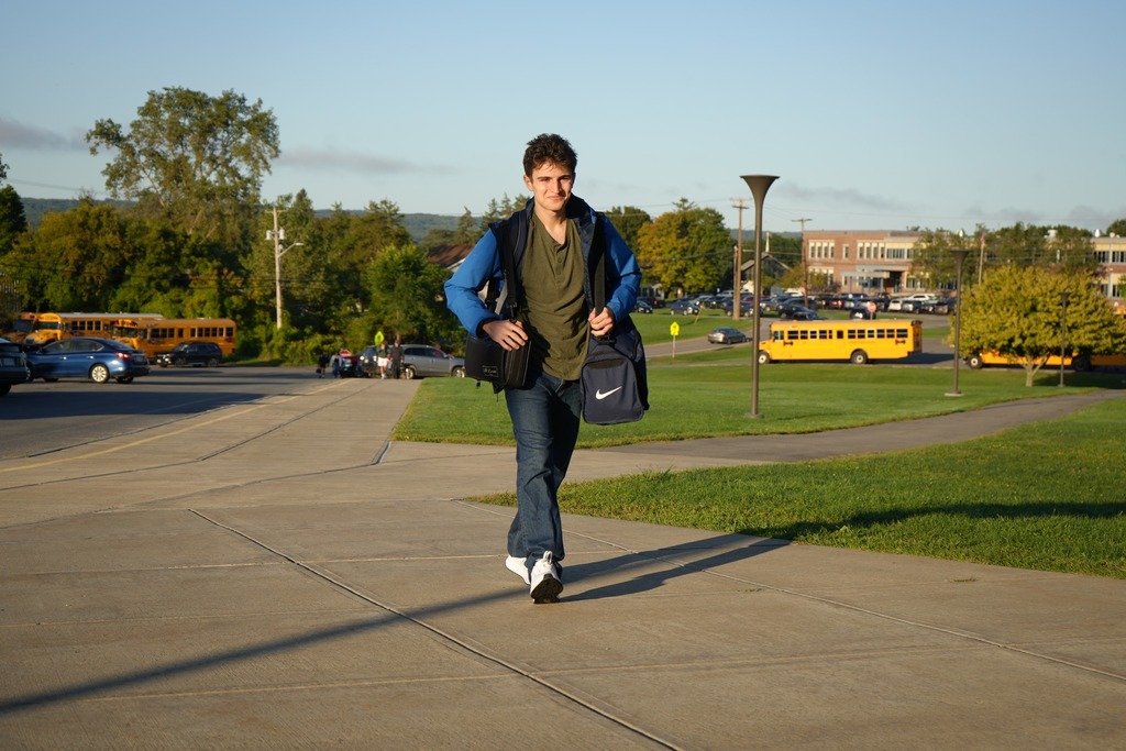 one student walking into school