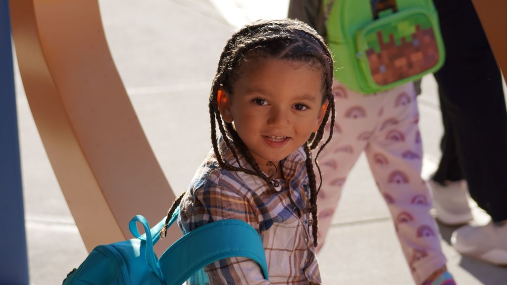 Student posing for picture and smiling