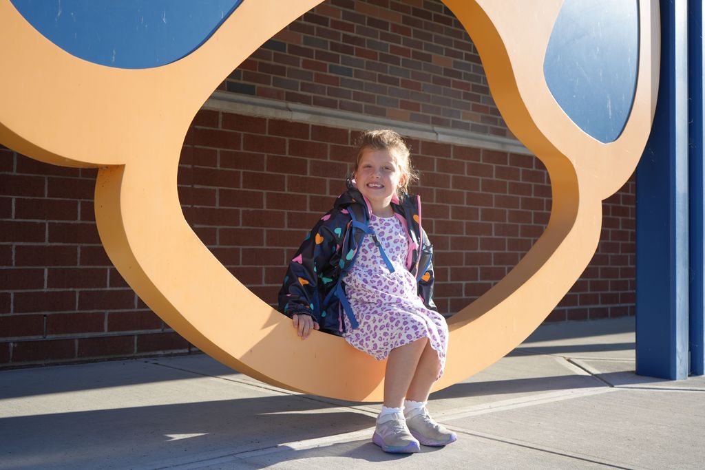 Student smiling before entering school