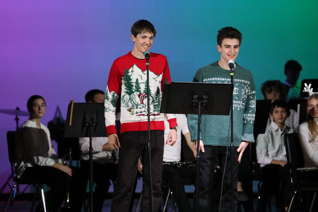 Two students who just finished singing 