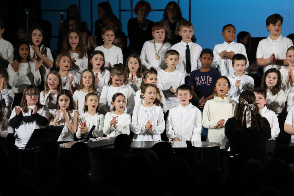 A group photo of the choir of the younger students 
