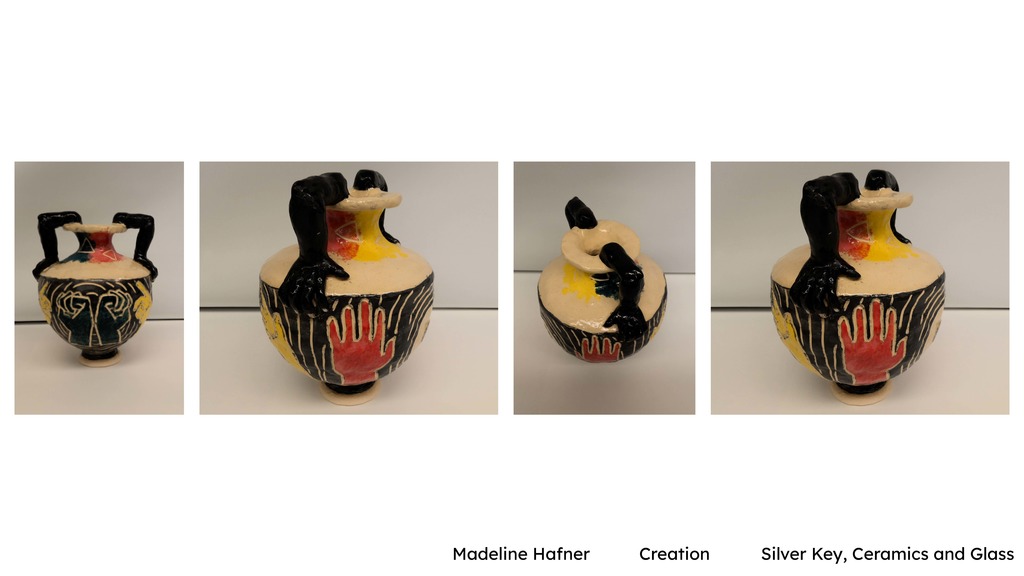 Madeline Hafner – “Creation” (Ceramics and Glass) Alt text: Multiple views of a hand-built ceramic vessel with sculptural handles. The piece features bold black, red, and yellow designs, including hand motifs and textured surface details, photographed against a plain background.