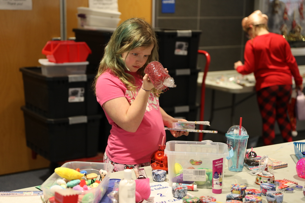 a student examine a possible gift