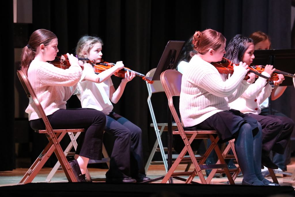 students performing during a band & orchestra concert