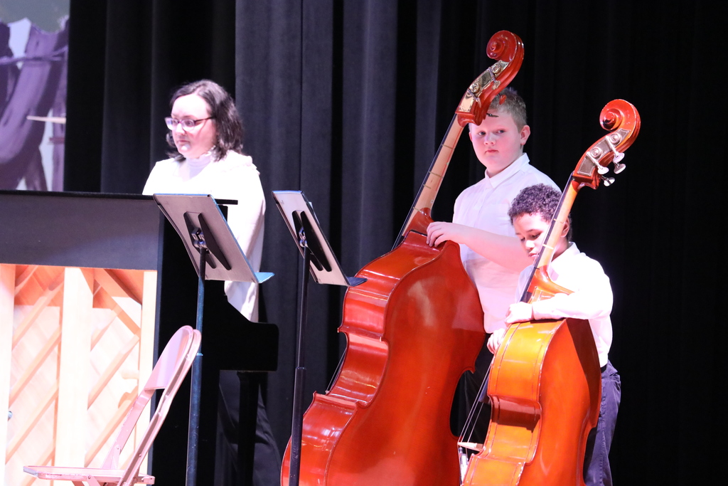 students performing during a band & orchestra concert