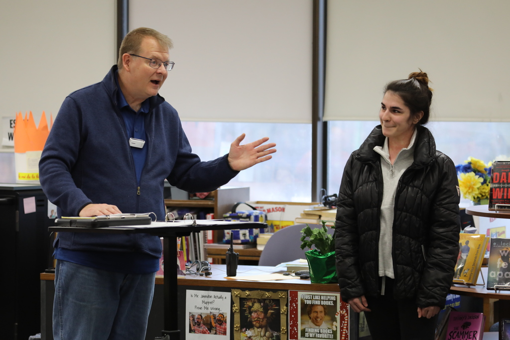a teacher talking about a student before giving award