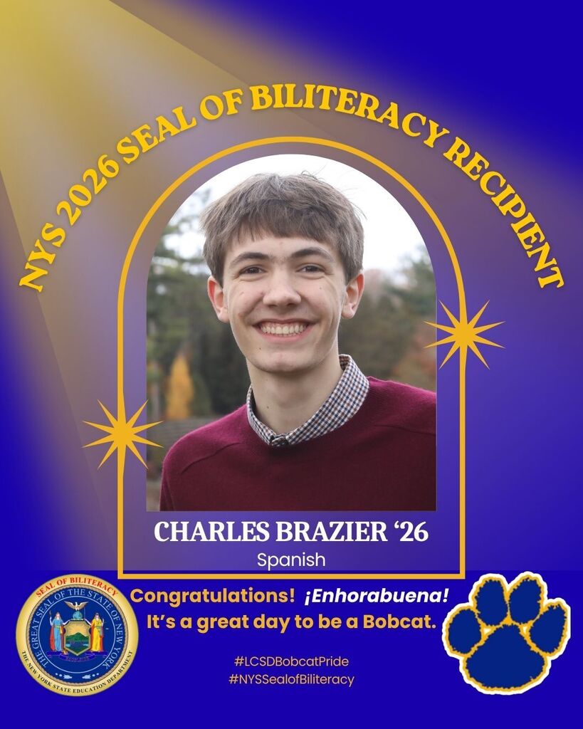 Graphic celebrating Charles Brazier, Class of 2026, as a New York State Seal of Biliteracy recipient in Spanish. The design includes a portrait photo with gold and purple Lansing Bobcats branding, congratulatory text in English and Spanish, the New York State Seal of Biliteracy emblem, and a Bobcat paw logo.