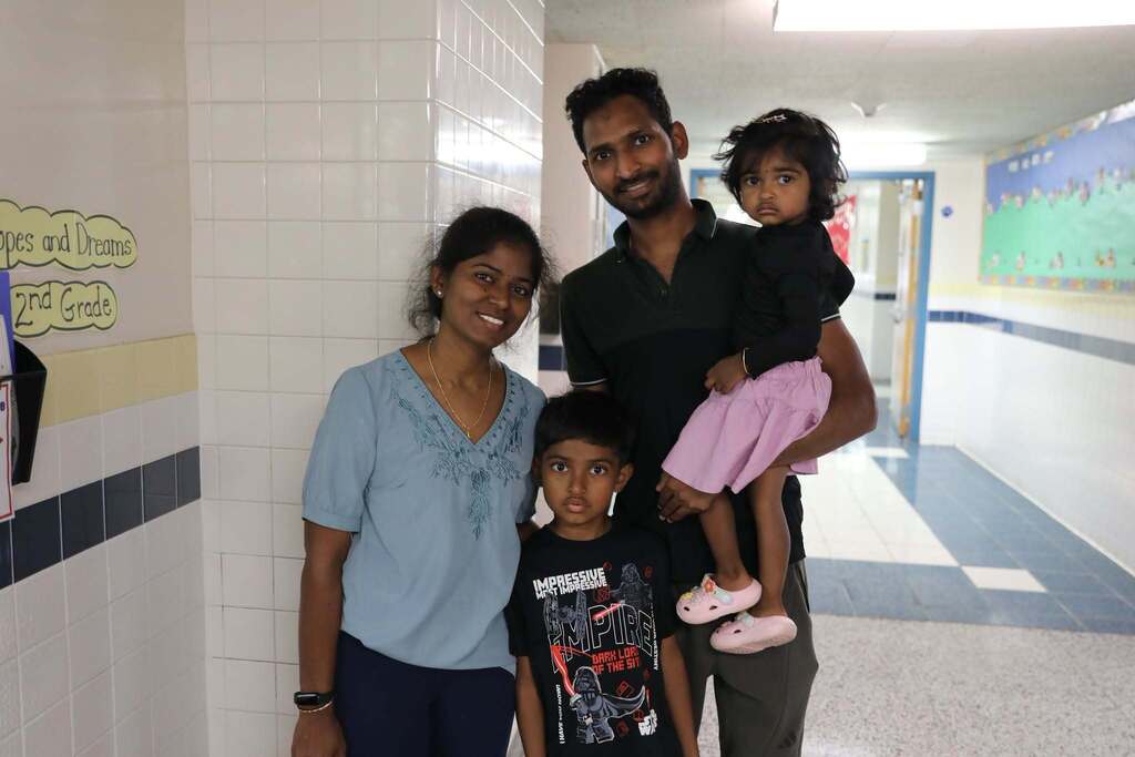 a family posing for a photo