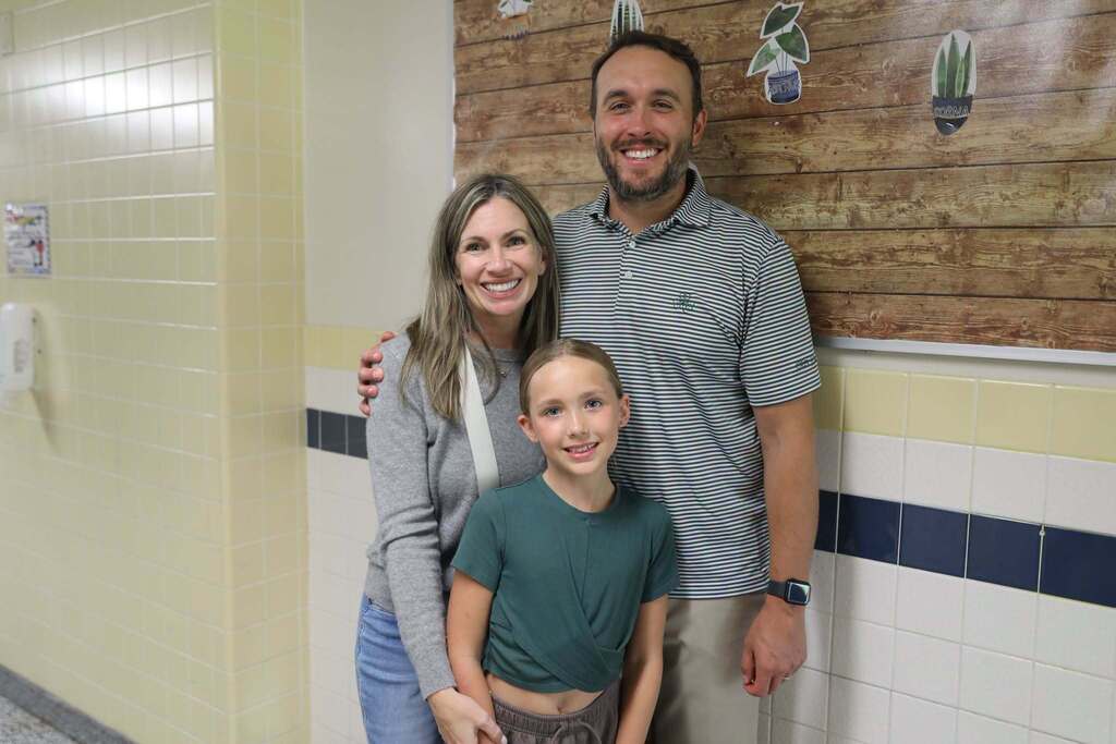 a family posing for a photo 