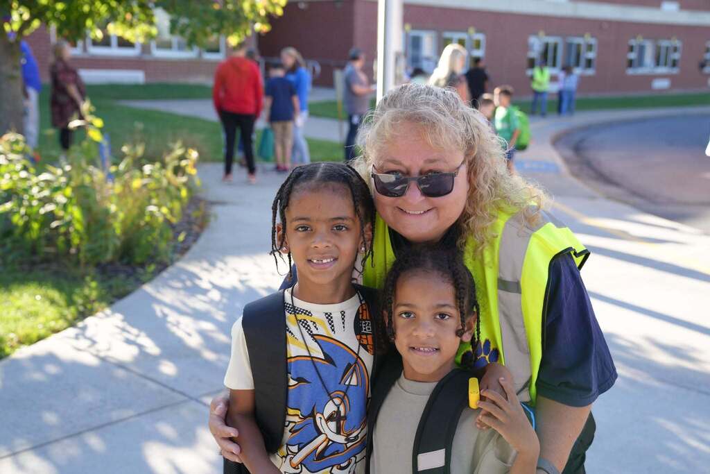 Principle with some students on their 1st day back