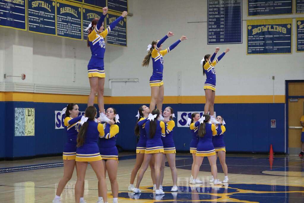 the cheerleaders striking a pose