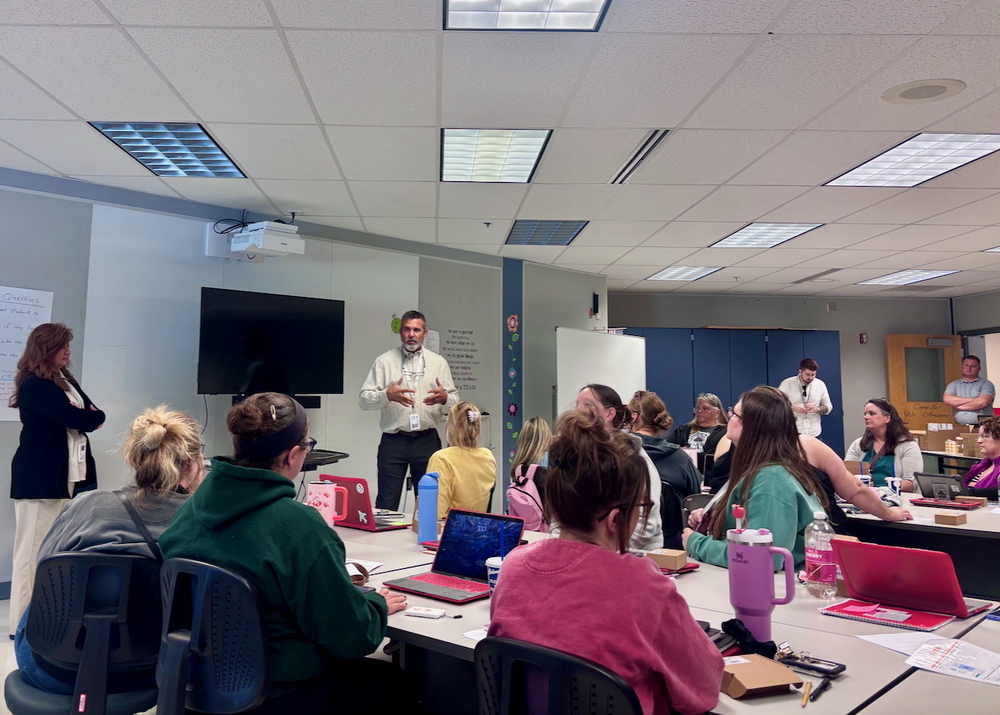 Superintendent talking to staff at PD day