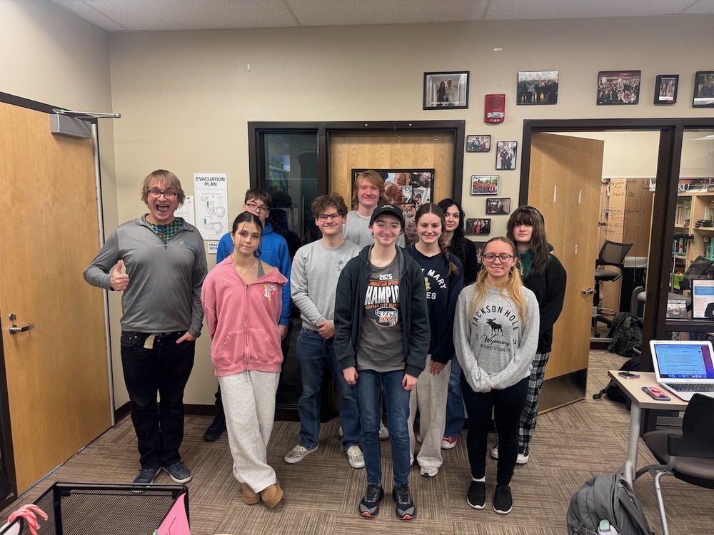 This week’s Academic Spotlight shines on Kevin Krouse, Director of Debate and Forensics at Lansing High School, and the way he uses showcasing and feedback to help students sharpen their performances before competition season. In Mr. Krouse’s class, students are constantly practicing, performing, and learning from one another. Through regular showcases, students present speeches, interpretations, and debates in front of peers, then receive meaningful feedback they can immediately apply. This process gives students the chance to grow their confidence, refine their skills, and walk into competitions feeling prepared to do their very best. That approach has paid off in a big way. In just his first year leading the program, Lansing Debate and Forensics has seen strong performances, multiple state qualifications, and a renewed sense of pride and momentum. Senior Bayne Yoakam summed it up well: “Getting second this year for state debate was such a grand experience. After losing our speech and debate coach in 2024, it’s been amazing watching Lansing’s program bounce back. From pacing outside our room before major debates to creating an amazing classroom environment, Mr. Krouse has been the key piece in continuing Lansing Debate’s legacy of success.” Freshman Eliana Silva shared how that feedback-focused environment helped her grow quickly. “Qualifying for State twice in my opening tournament was a surprise. I didn’t even realize it until Mr. Krouse pointed it out. I’m excited to go, and I know I still have a lot of growing to do.” What stands out most is how intentional Mr. Krouse is with his students. Senior Bruce Blankartz noted that he pushes students to be their best without ever losing sight of their well-being. He described Mr. Krouse as someone who sets clear practice goals, builds trust, and creates a positive culture where students feel supported, challenged, and valued. These are all traits we look for here in Lansing, and the fact that a first-year teacher is exhibiting them is outstanding. For many students, the impact goes beyond medals and rankings. Freshman Maddie Huhn shared, “Speech and debate has given me the voice that I didn’t know I had. I’ve had so much fun, and I’ve learned a lot about myself and other people.” Mr. Krouse credits the success to the students and the support around him. “My first year as Director of Debate and Forensics has been a dream come true,” he shared. “The students are truly amazing, bright, motivated, and kind. It’s an honor to continue the longstanding legacy of success that Lansing Debate and Forensics has established.” Thank you, Mr. Krouse, for rebuilding, leading, and inspiring. Lansing High School’s Debate and Forensics program is in great hands and we’re very lucky to have you with us! Lansing Speech and Debate has a long history of sending students to nationals, and this year looks just as promising. Families and community members who wish to support the program can make donations by check to Lansing Speech and Debate, submitted to the high school.