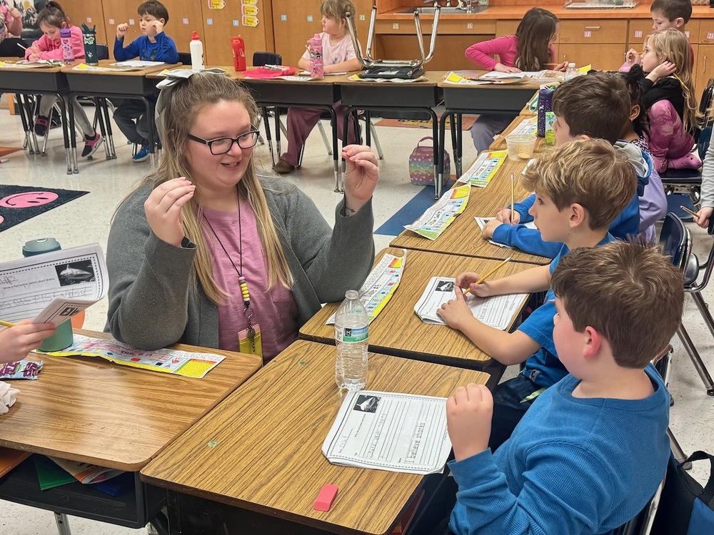 First grade teacher and students