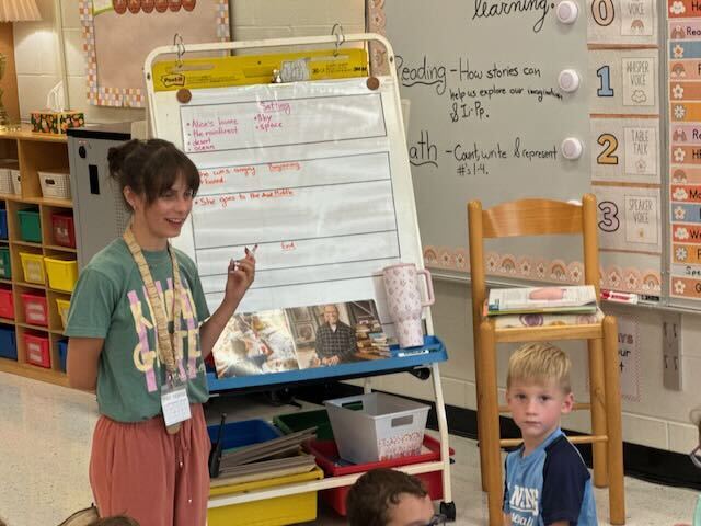 First Graders at their desks in a classroom