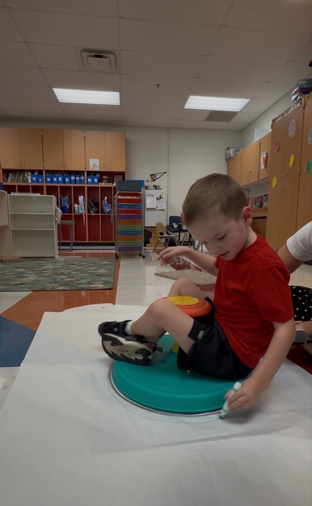 Preschoolers celebrating dot day in their classroom